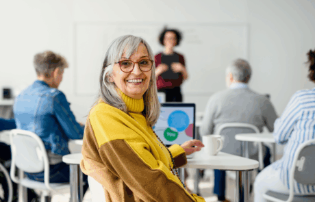 Portrait of senior attending computer and technology education class.