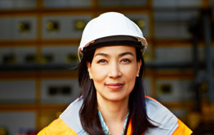 asian woman hardhat trades