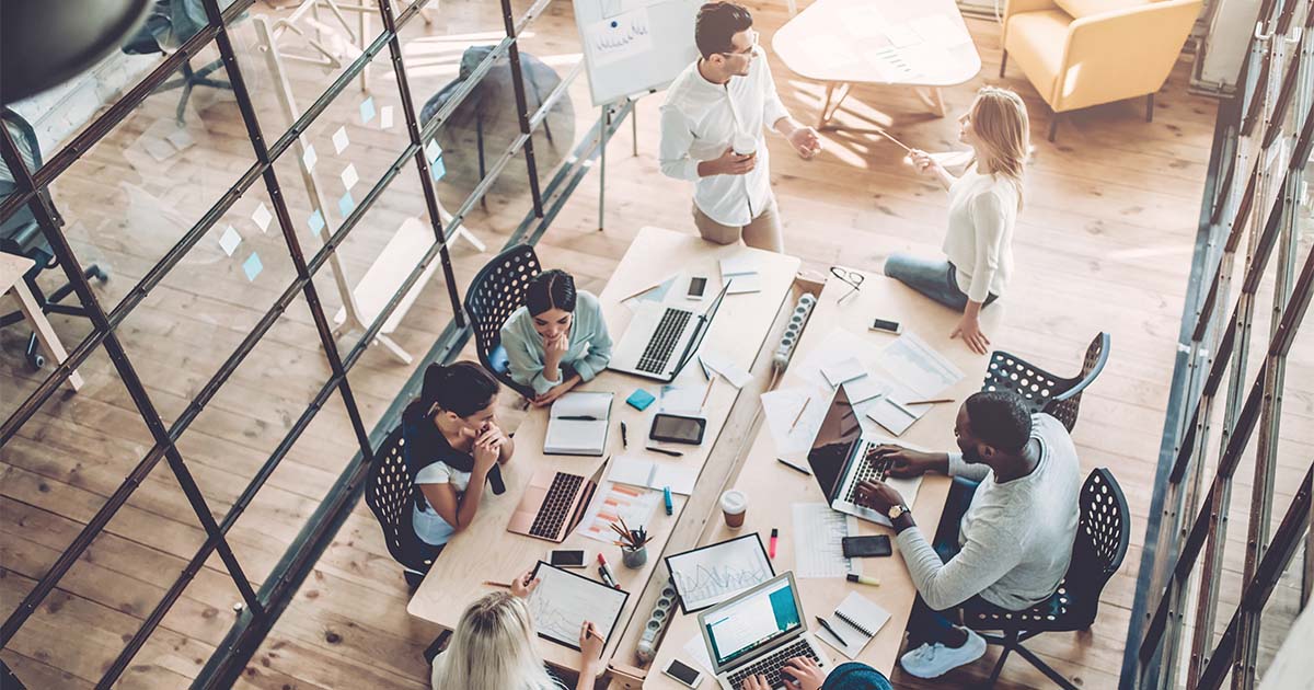 office workers around a table