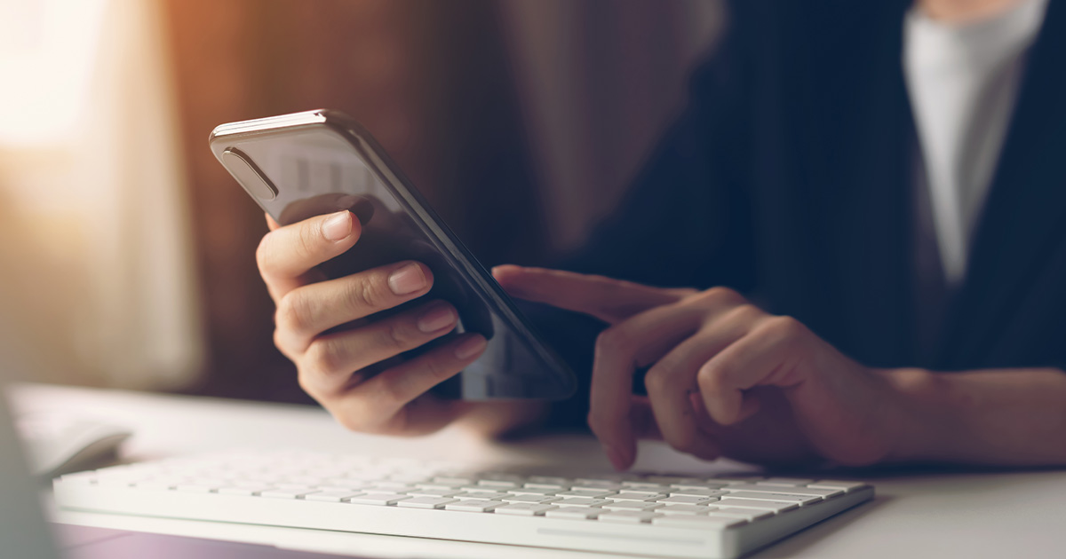 A picture of someone using an iphone