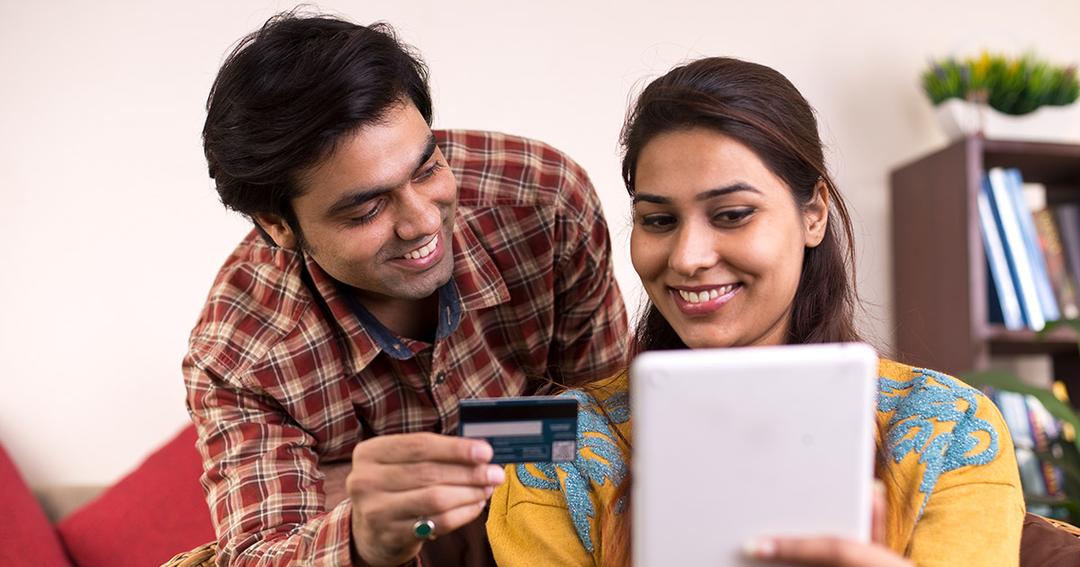 Couple digitally banking