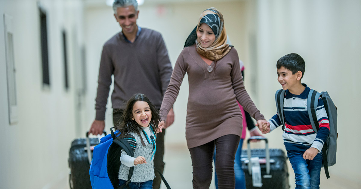 Happy family in an airport