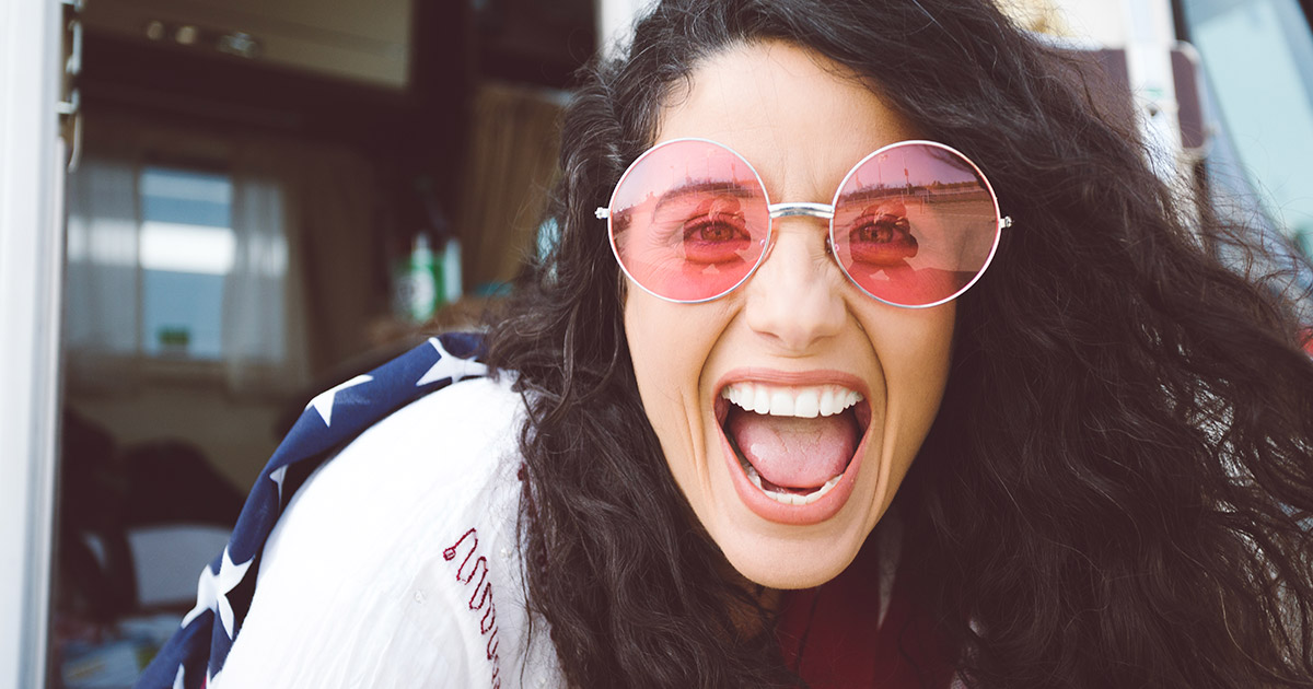 Woman laughing and smiling