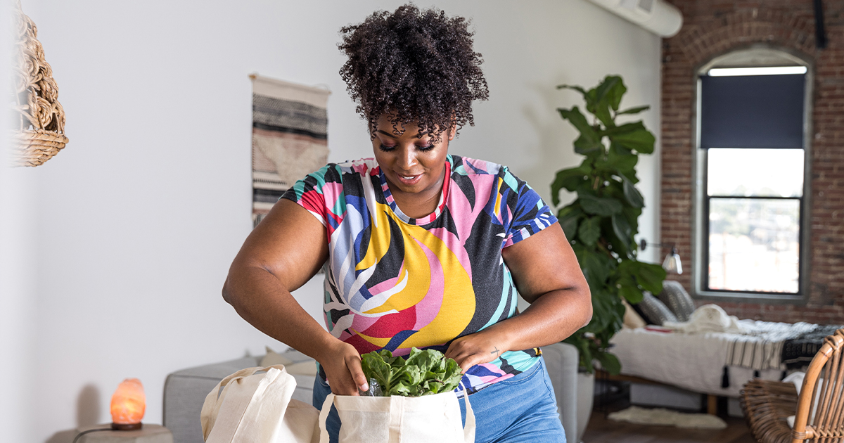 Women back at home after shopping groceries