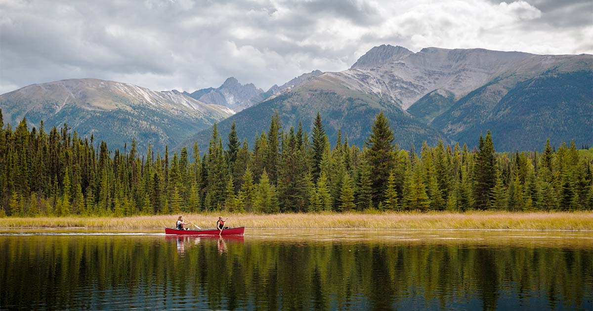 two people canoeing