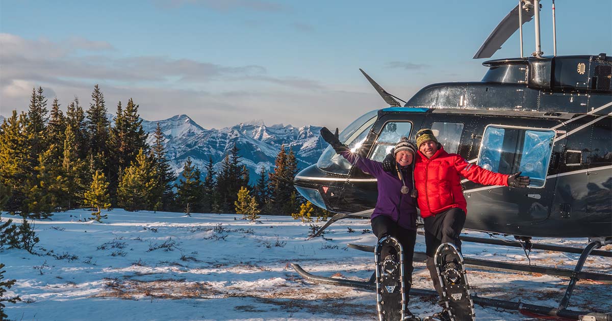 dev and deb planet d snow capped mountains helicopter