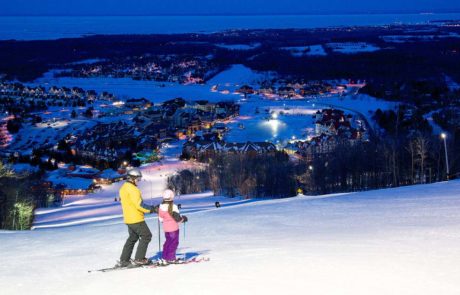 Child skiing with parent_Marriott_bonvoy_hotel