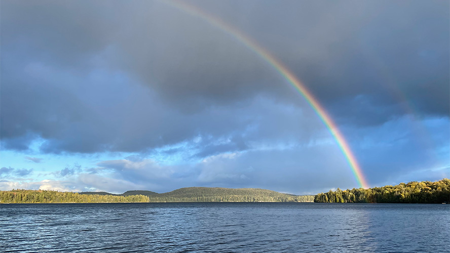 Rainbow over the lake outdoors
