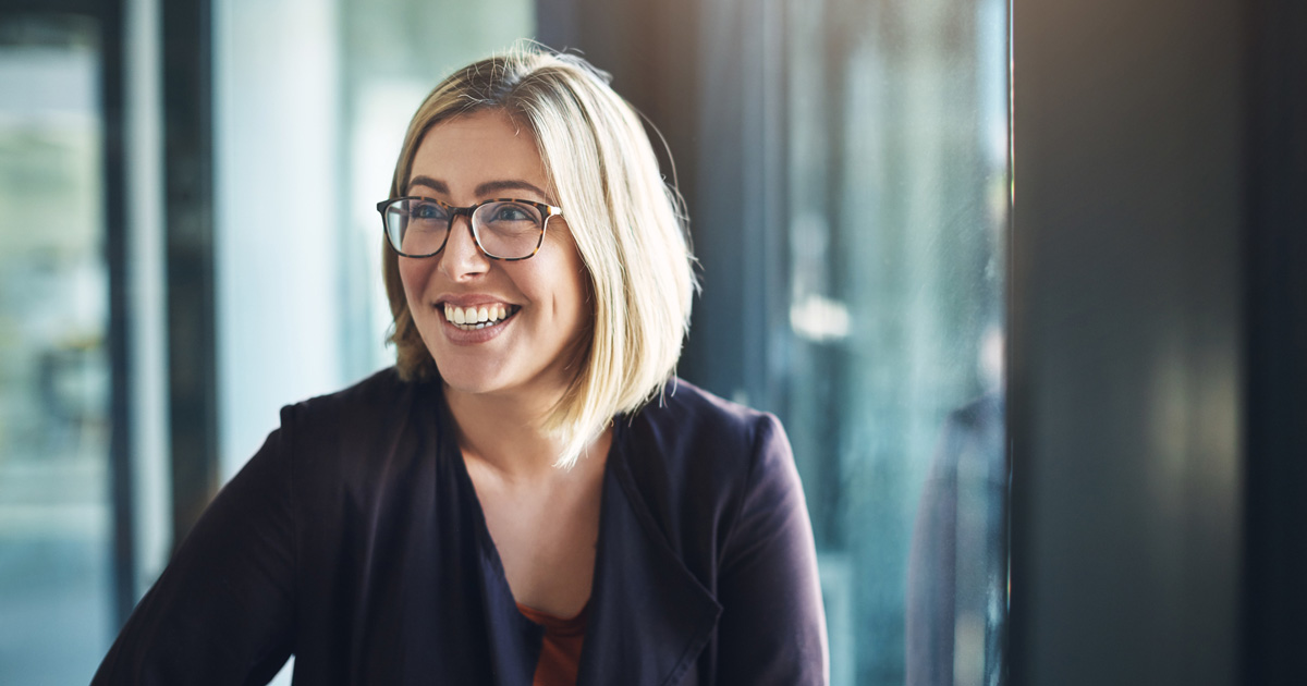 happy businesswoman in a modern office