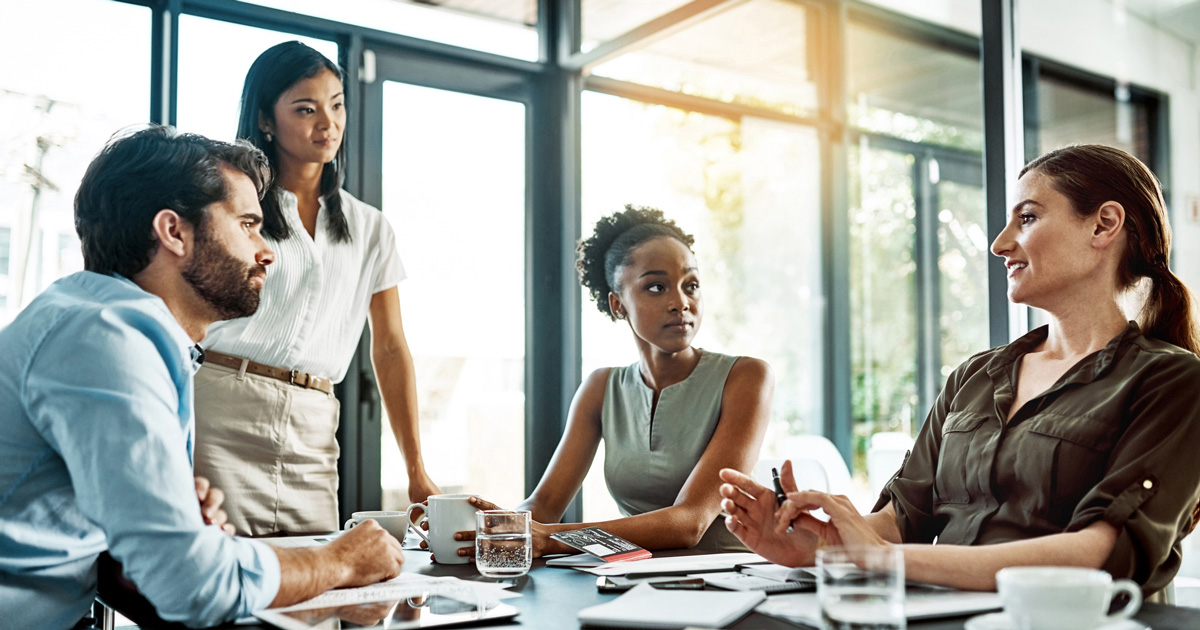 group of colleagues having a meeting in a modern office