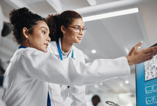 Teamwork, technology and analysis in laboratory for science, innovation or experiment. Collaboration, group and woman in clinic or hospital for research, advice or professional career in medical care