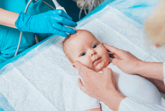 Doctor and little boy patient. Ultrasound equipment. Diagnostics. Sonography.