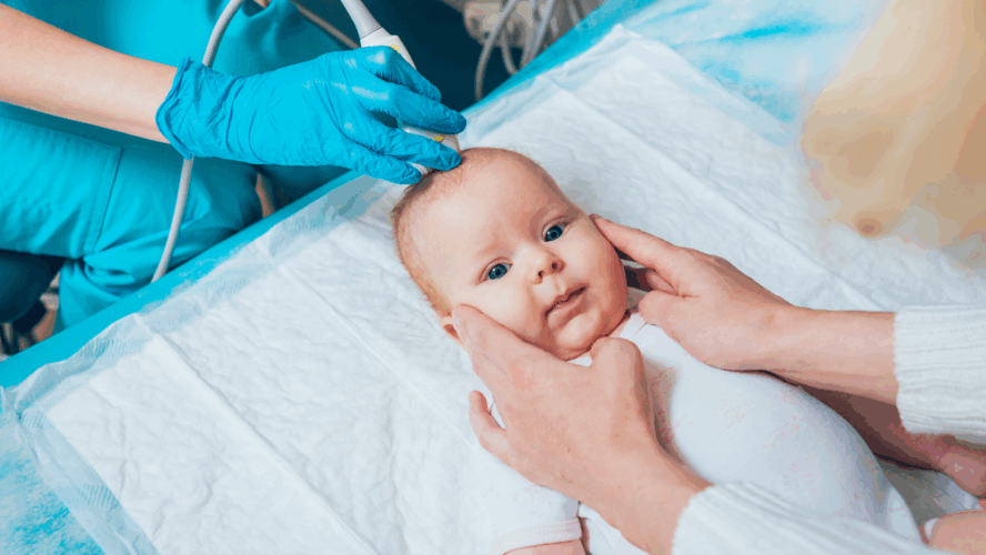 Doctor and little boy patient. Ultrasound equipment. Diagnostics. Sonography.