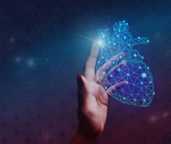 Human forefinger touches blue heart innovative technologies. Nebula dust in infinite space. Mixed media.