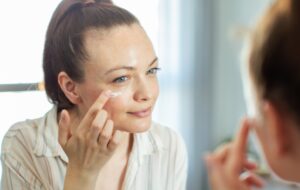 Close up of a young woman getting ready at home