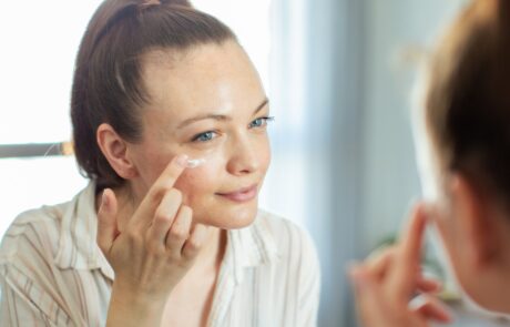 Close up of a young woman getting ready at home
