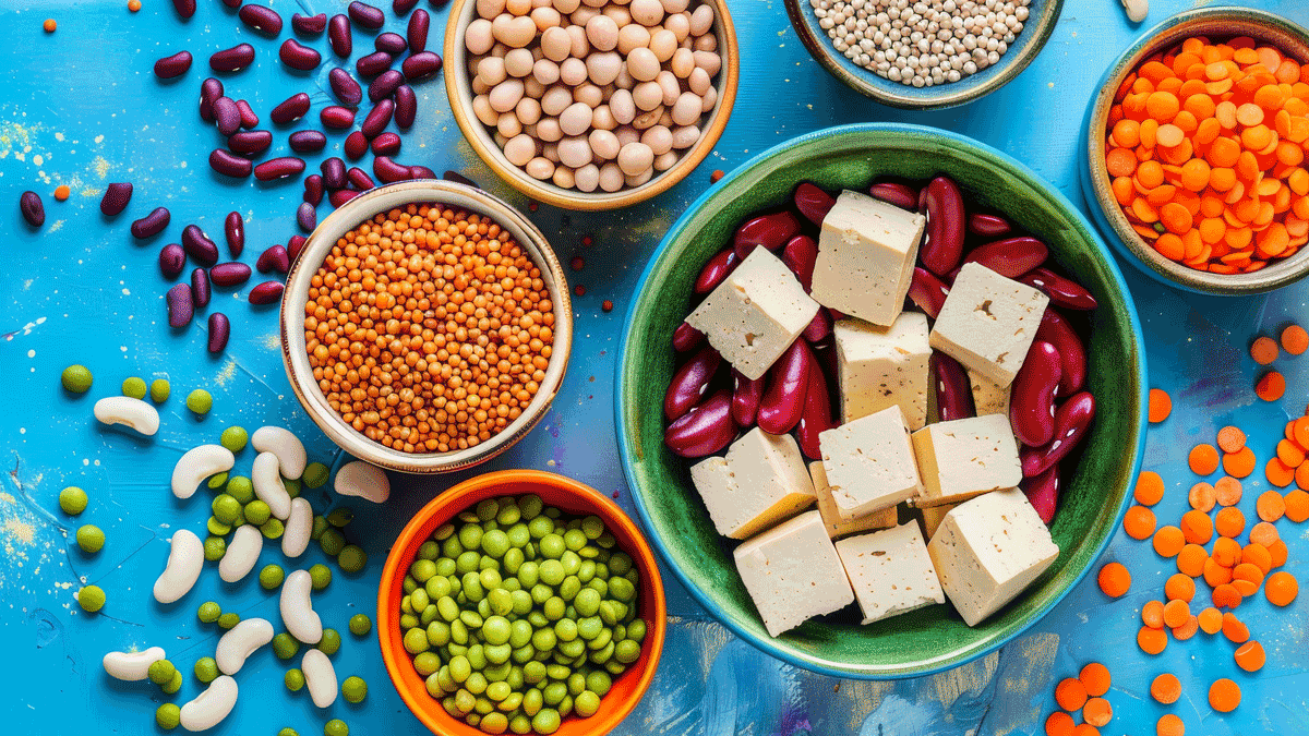 A colorful display of plant-based protein sources. featuring beans, lentils, and tofu. showcasing alternatives to animal protein. Ideal for vegan nutrition guides