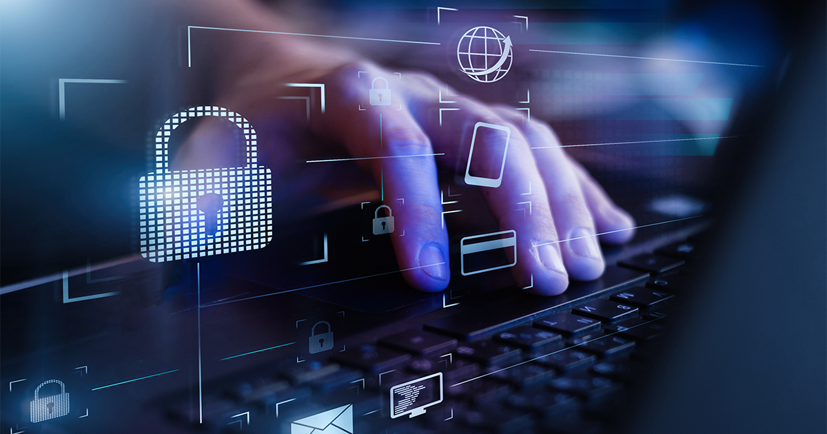 Closeup view of man`s hand using laptop with virtual digital screen with icon of lock on it.