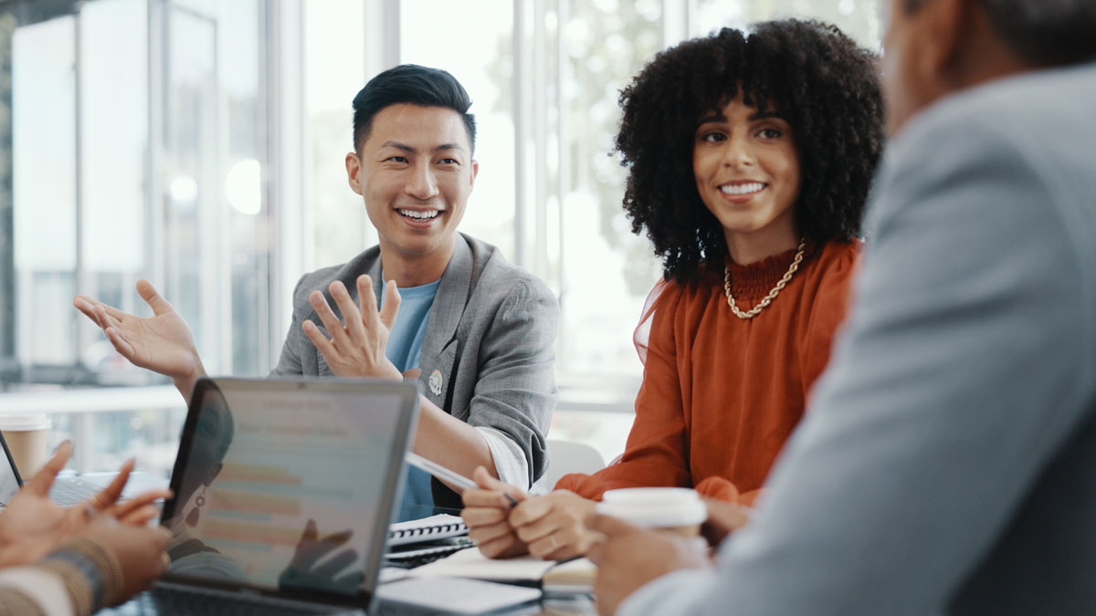 Meeting, collaboration and team planning a project together in the office conference room. Teamwork, diversity and business people in discussion while working on a b2b corporate strategy in workplace