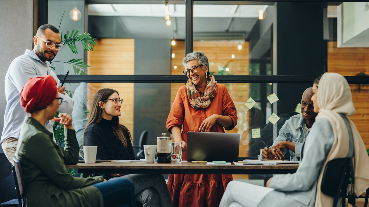 Cheerful businesspeople having a meeting in a boardroom