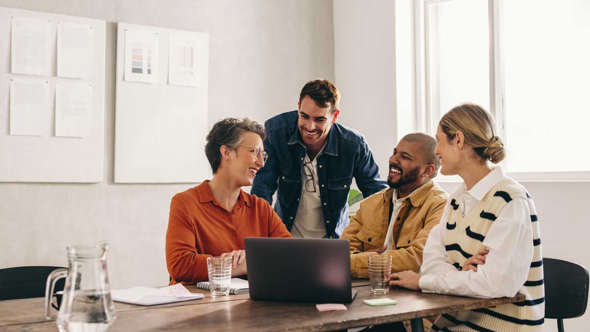 Cheerful designers having a meeting in an office