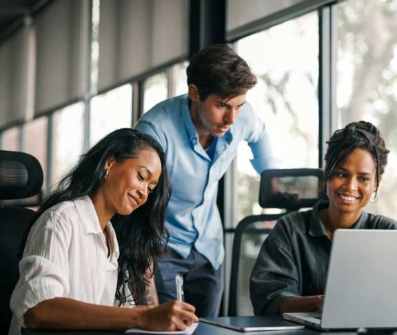 Group of busy happy diverse professional business team people working in office using digital tablet