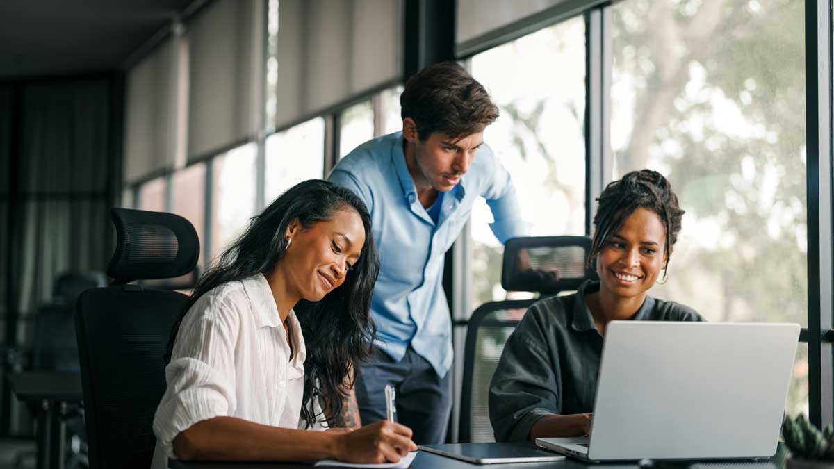 Group of busy happy diverse professional business team people working in office using digital tablet