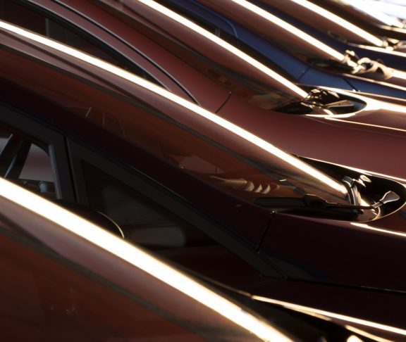 Outlines of a group of cars in a row