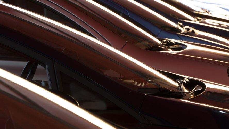 Outlines of a group of cars in a row