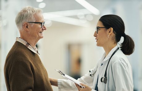 Male patient and female doctor talking
