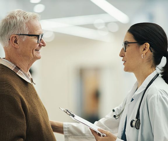 Male patient and female doctor talking