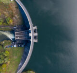 Aerial photograph of the Saint Etienne Cantales hydroelectric dam. Cantal. Auvergne. France. October 10, 2020. Photographie aerienne du barrage hydroelectrique de Saint Etienne Cantales. Cantal. Auvergne. France. 10 Octrobre 2020.