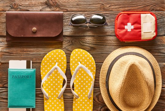 Travel and beach items flat lay still life