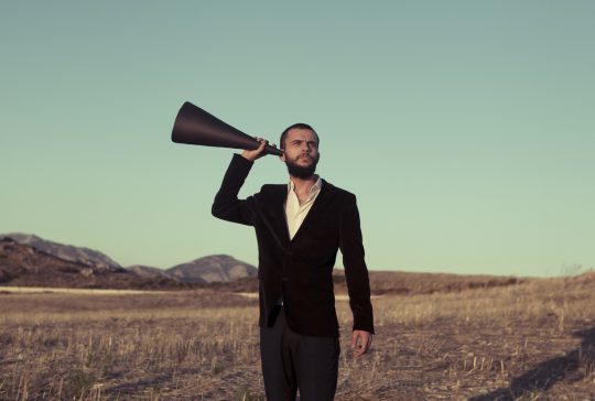 Young Adult Acting Like He Can't Hear Anything.