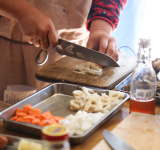 Frau Kochen Kochkurs Bild