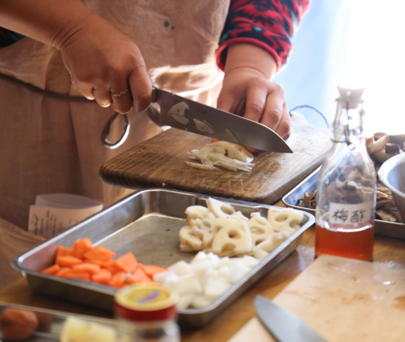 Frau Kochen Kochkurs Bild