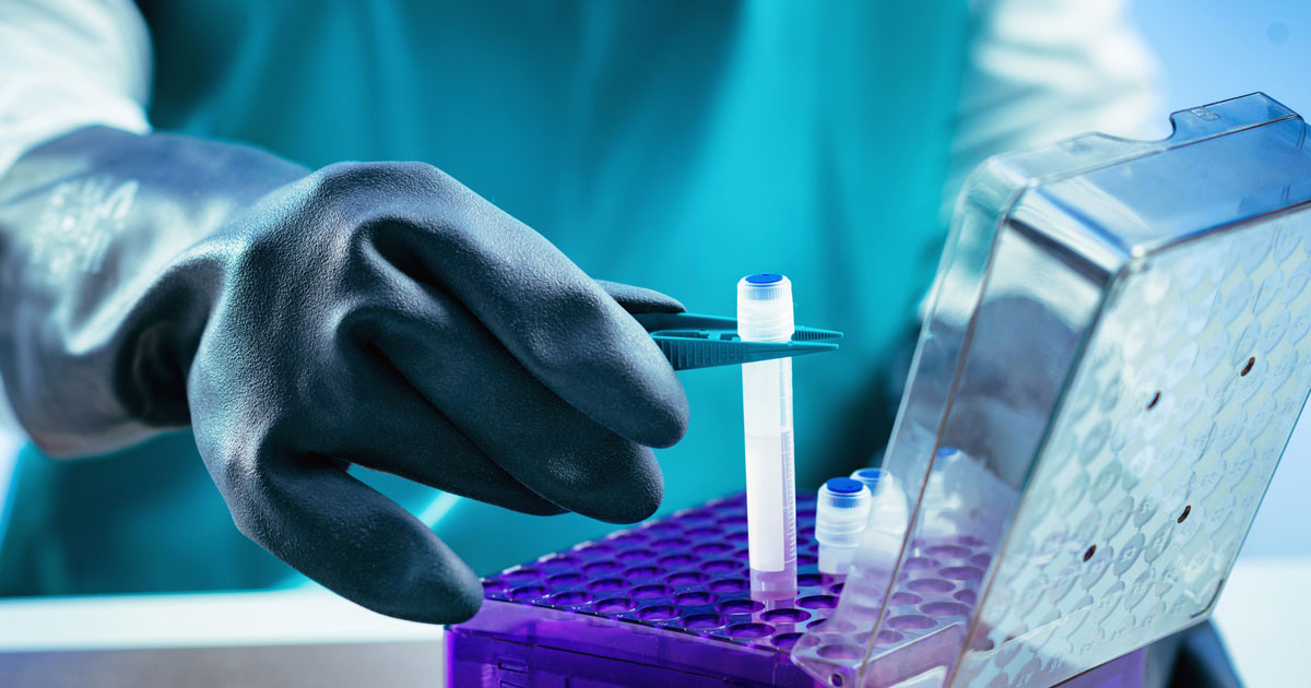 Biobanking. Technician preparing biological sample for deep freezing