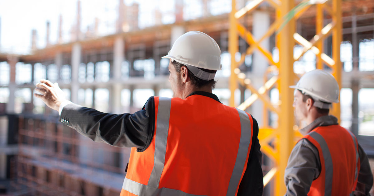 Construction workers working on construction site