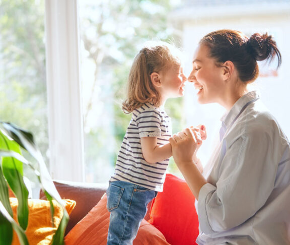 mother and daughter playing