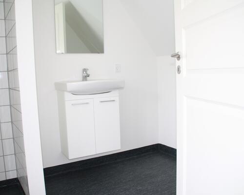 Stor 8 værelses lejlighed centralt i Assens