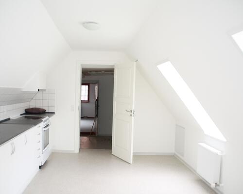 Stor 8 værelses lejlighed centralt i Assens