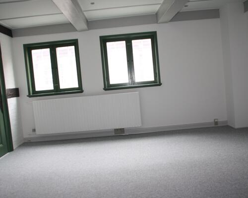 Stor 8 værelses lejlighed centralt i Assens