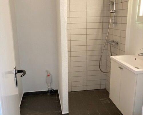 Charmerende Lejlighed med Havudsigt og Eftertragtet Beliggenhed