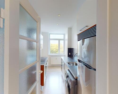 Delevenlig 4 værelses med altan