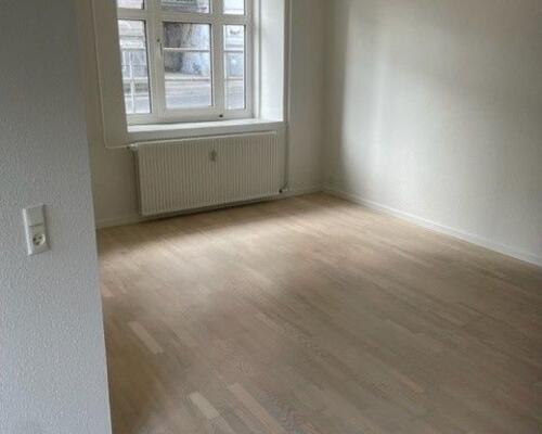 Kælderlejlighed tæt på centrum