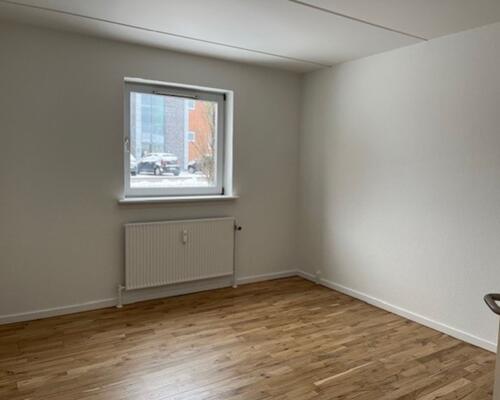 Stue lejlighed med god syd/vestvendt terrasse