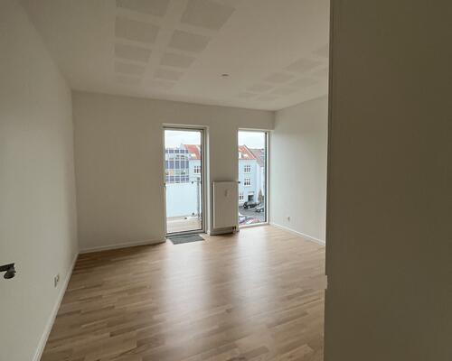 Dejlig 4-værelses i centrum!