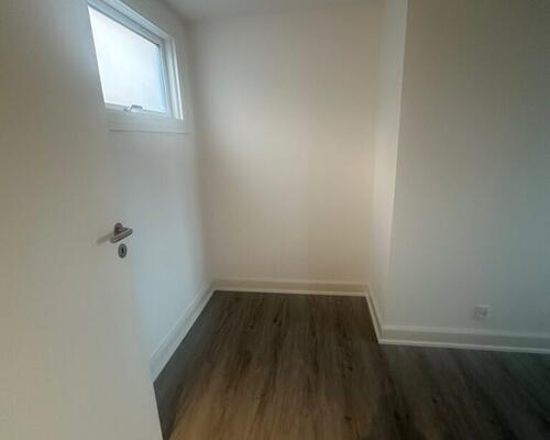 Nyrenoveret penthouselejlighed med tagterrasse i centrum af Fredericia