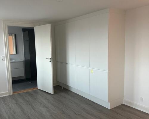 Nyrenoveret penthouselejlighed med tagterrasse i centrum af Fredericia