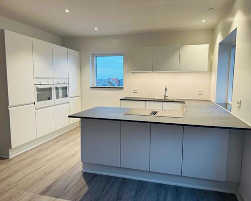 Nyrenoveret penthouselejlighed med tagterrasse i centrum af Fredericia